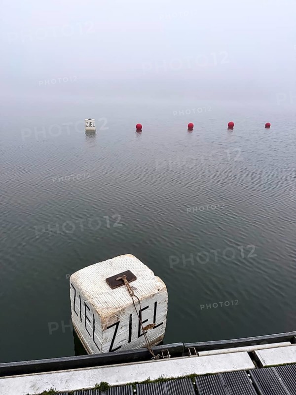 Buoys for water sports in dense fog on Lake Baldeney in Essen, foggy weather in winter, North Rhine-Westphalia, Germany