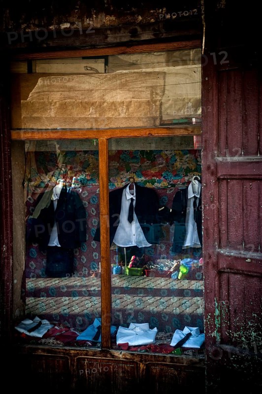 Shop window with fashion, dilapidated, historical, culture, shirt, suit, shop, shopping, shop, shopping, menswear, old, vintage, Marrakech, Morocco