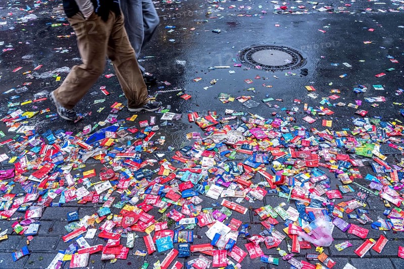 Rose Monday procession in Düsseldorf, remains of camels, confetti, various carnival trash, stuck on the roads along the train path after heavy rainfall, remnants of the procession, North Rhine-Westphalia, Germany
