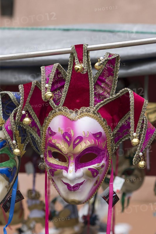 Venetian carnival mask in front of a shop, Burano, Veneto, Italy