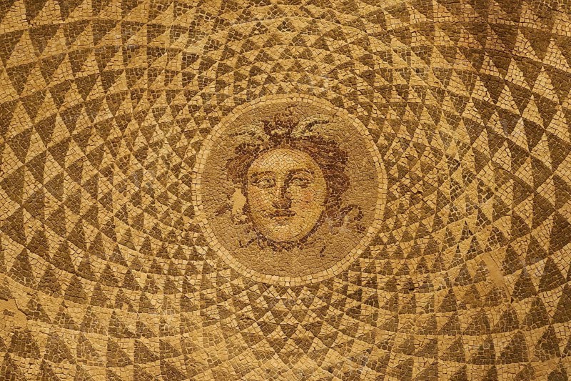 Ancient mosaic with Medusa head in the middle of a circular pattern, Patras Archaeological Museum, Patras, Peloponnese, Greece