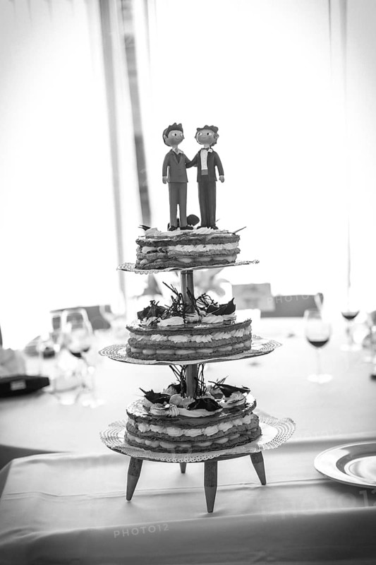 Detail of the dolls on top of the wedding cake, traditional ceremony, black and white photo