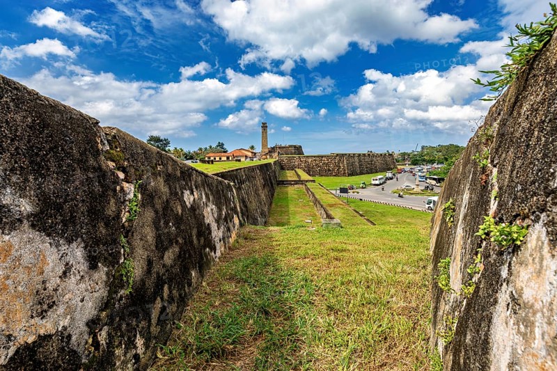 View along a fortress wall with wide sky and landscape, The fortress of Galle in Sri Lanka