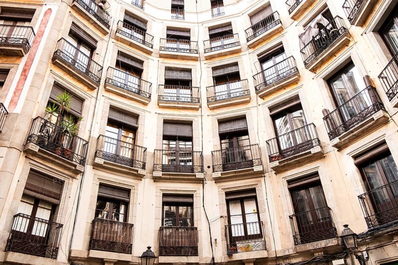 A house built in a semicircle on a square in the historic centre of Barcelona, Spain