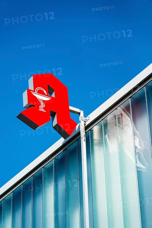 Pharmacy sign on a house facade in Düsseldorf, Germany