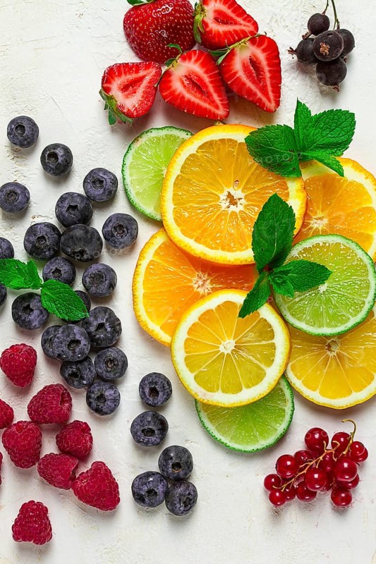 Mix of fruits and berries, set, assortment, sliced citrus fruits, raspberries, blueberries, mint leaves, strawberries, red currants, food background, fruit wallpaper