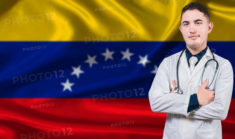 Portrait of medical professional on Venezuela flag background.Venezuelan national health system