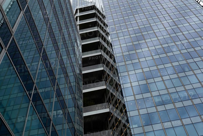 Abstract view of high rise glass fronted office buildings in a Paris commercial and financial district, France