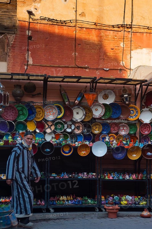 Merchant in the medina, man, ceramics, plate, shop, souvenir, shopping, travel, holiday, city trip, african, orient, oriental, arabic, Marrakech, Morocco