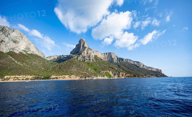 Picturesque rocky coast, cliffs and blue sea, Golfo di Orosei, Baunei, Sardinia, Italy