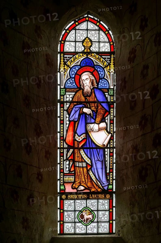 Stained glass window of Saint Luke by Horwood 1878, church of Saint Mary the Virgin, Silchester, Hampshire, England, UK