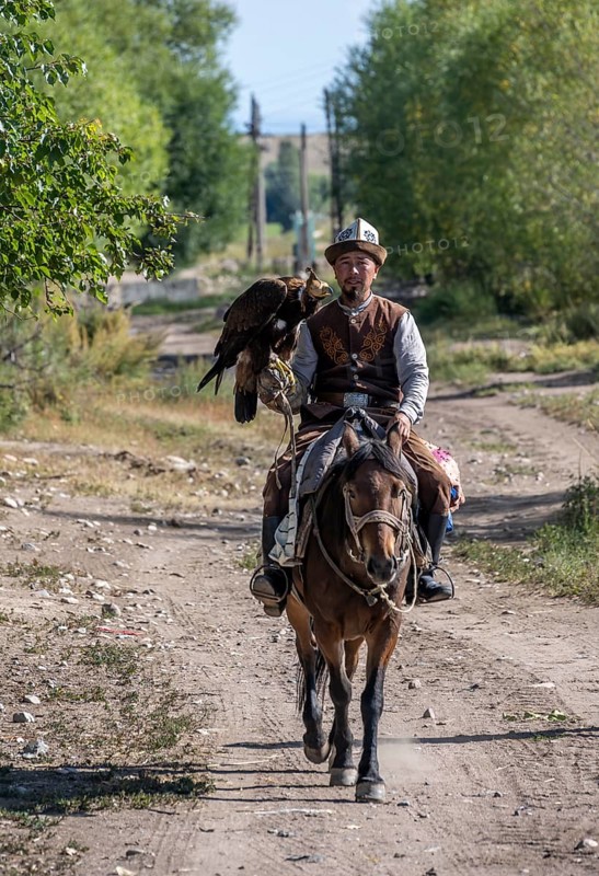 Traditional Kyrgyz eagle hunter, near Kysyl-Suu, Kyrgyzstan