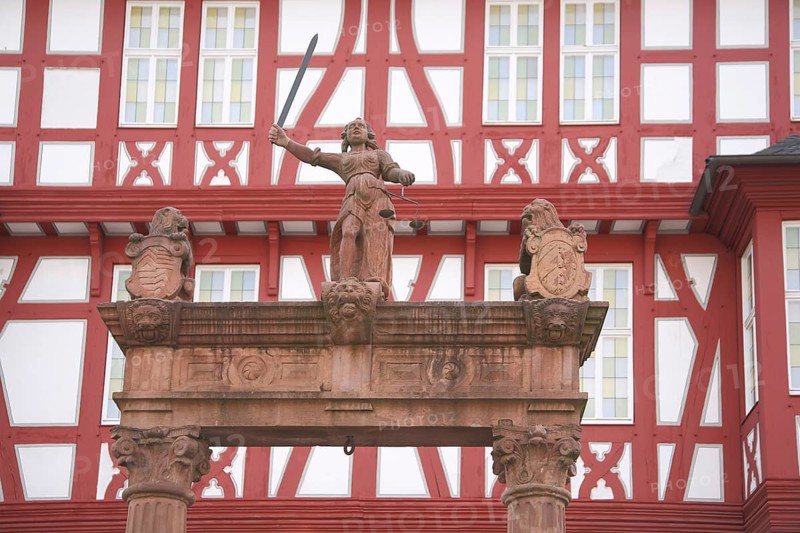 Justitia sculpture, fountain, red frame, German Goldsmith House, Hanau, Hesse, Germany