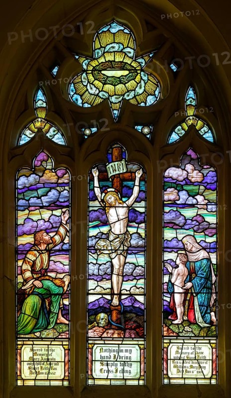 Stained glass window of Crucifixion by TW Camm 1907, Wroughton church, Wiltshire, England, UK