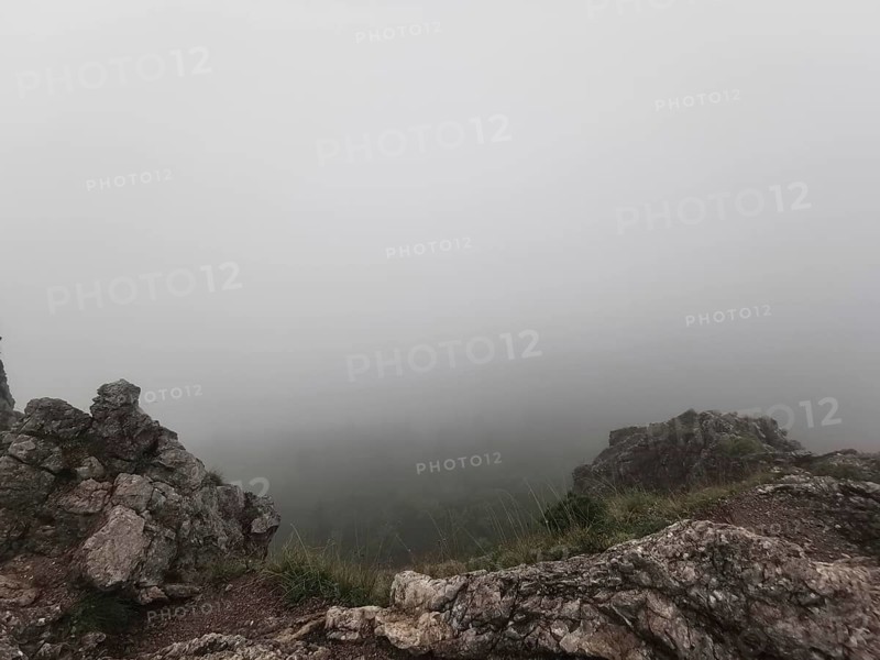 Misty view of rocky landscape with invisible background, Zakopane, hiking in the High Tatras National Park, Carpathian Mountains, Poland