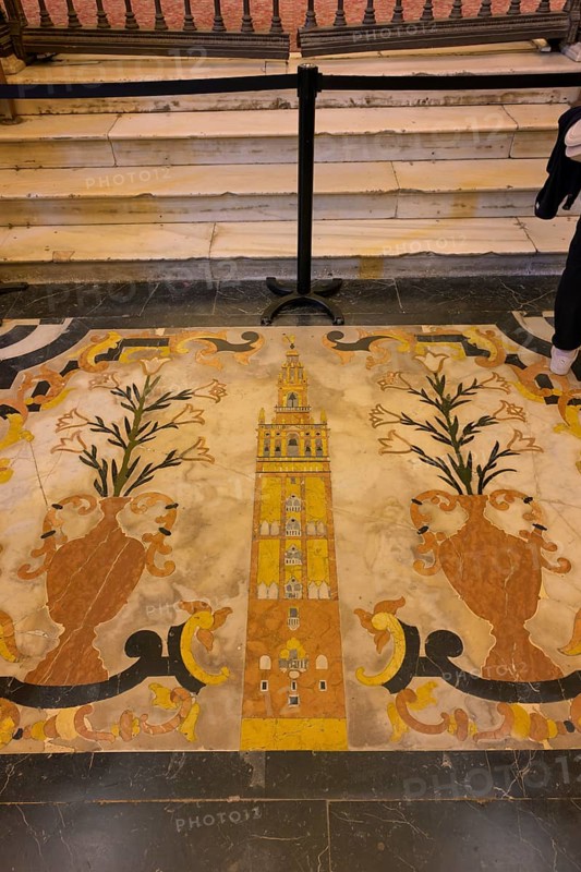 Mosaic floor shows artfully designed, colorful detailed decorations, Seville, Andalusia, Spain