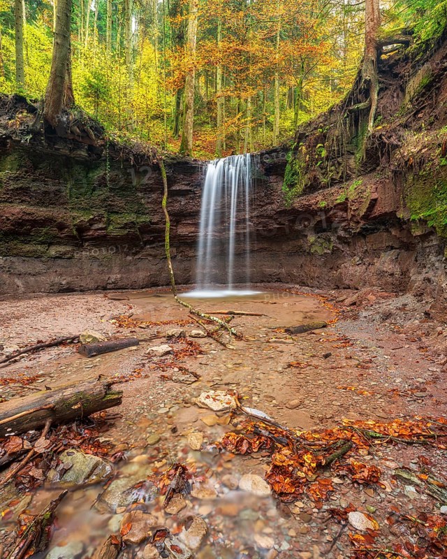 The front waterfall of the Hörschbach in autumn, Hörschbachtal, Hörschbachschlucht, Swabian-Franconian Forest nature park Park, Baden-Württemberg, Germany