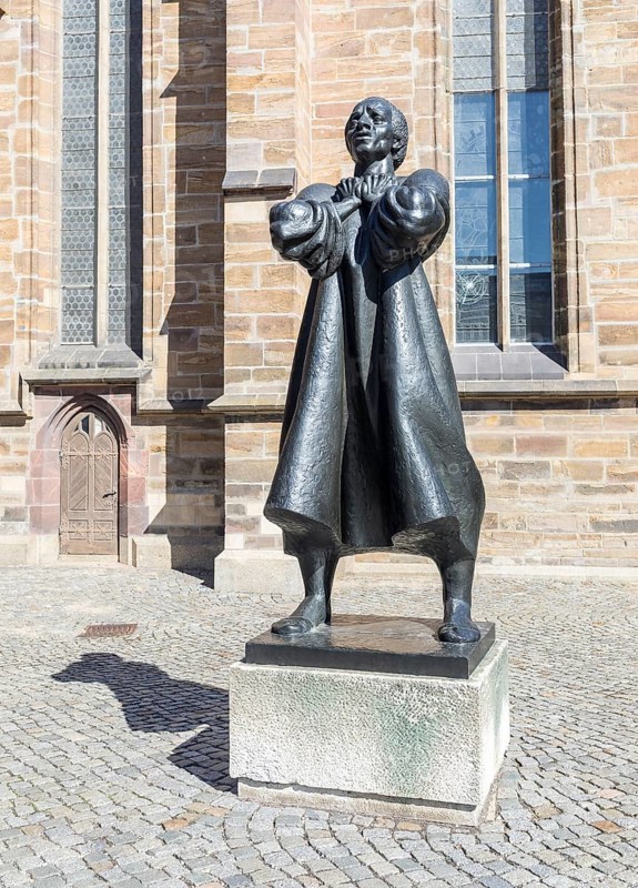 Statue of Thomas Müntzer, created by Jürgen Raue, in front of St Catherine's Church, Zwickau, Saxony, Germany