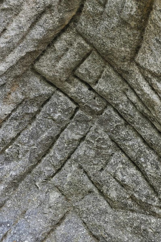 Grooves in the sandstone rock from carving millstones at the Hohllay cave in Berdorf, Little Switzerland, Mullerthal, Grand Duchy of Luxembourg