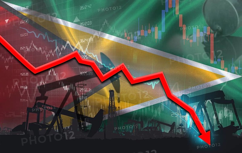 Crude crisis with Guyanese flag on financial graph. Fall oil price with flag of Guyana on economic chart