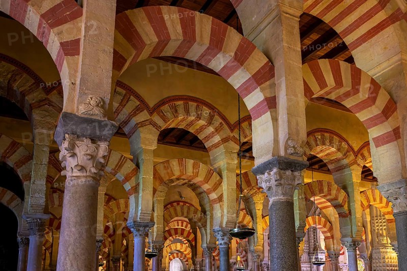 Detailed section of an interior of the cathedral mosque of Córdoba (Mezquita-Catedral), with magnificent arches and ornate architectural features, Cordoba, Andalusia, Spain