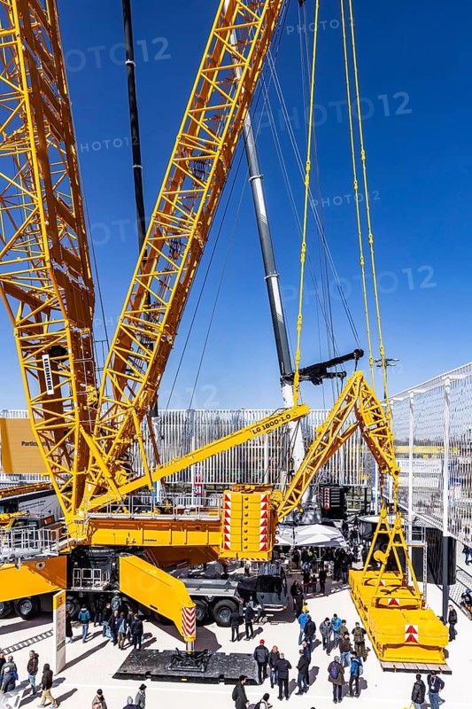 LG 1800-1.0 lattice boom crane with a maximum lifting height of 204 metres for wind turbines. BAUMA Munich, 34th World's Leading Trade Fair for Construction Machinery, Building Material Machines, Mining Machines, Construction Vehicles and Construction Equipment. In 2025, the trade fair will attract around 600, 000 visitors from more than 200 countries and regions and 3601 exhibitors. Open-air area with exhibits from Liebherr. Munich, Bavaria, Germany