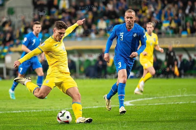WROCLAW, POLAND - MARCH 26, 2024: Qualifications for UEFA Euro 2024. Final play-off match Ukraine - Iceland 2:1. In action Georgiy Sudakov (L) Gudmundur Thorarinsson (R)