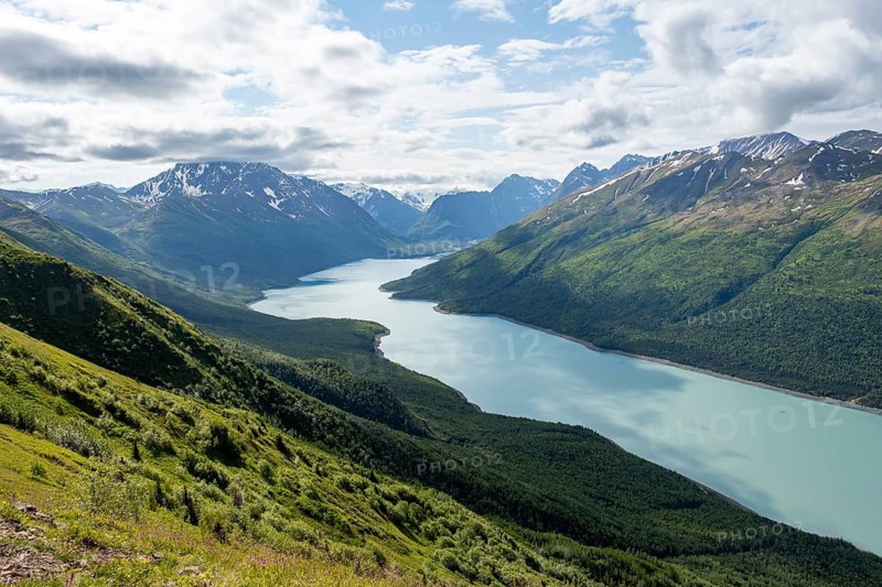 View of blue lake and mountains on Twin Peaks Trail, Eklutna Lake, Chugach Mountains, Chugach State Park, Alaska, USA
