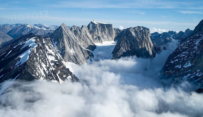 Rock cliffs, snow and ice, epic mountains with glaciers, aerial view, Alaska Range, Denali National Park, Alaska, USA