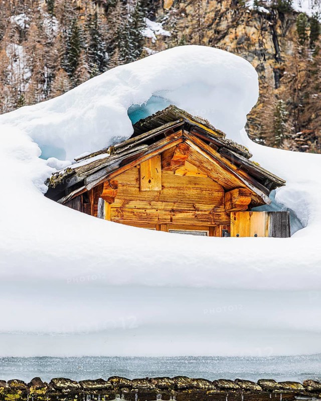 Snow-covered dormer window, mountain village of Zinal, Val d'Anniviers, Valais Alps, Canton Valais, Switzerland