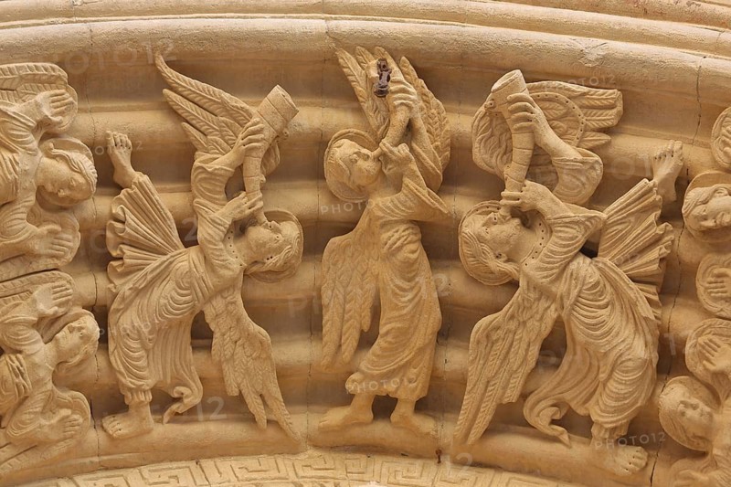 Sculptures with biblical symbolism, angels with trumpets, trombones ringing at the tympanum, stone carving, handicrafts, St-Trophime church, Arles, Provence, Ste-Anne, Place de la République, Arles, Bouches-du-Rhône, Camargue, Provence, France
