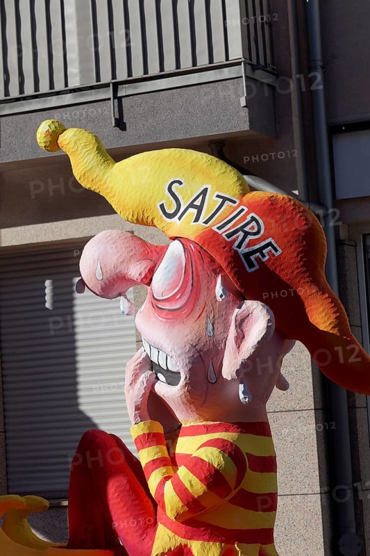 Personified satire with jester's cap is afraid of prohibitions, papier-mâché figure by Jacques Tilly, Rose Monday parade 2025 float, Düsseldorf, Rhineland, North Rhine-Westphalia, Germany
