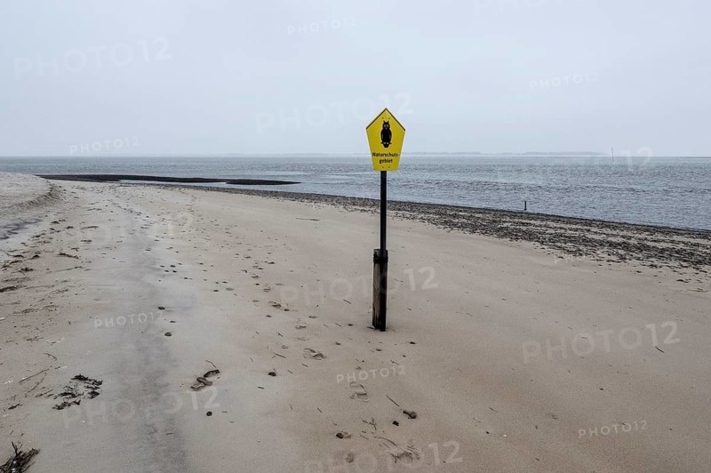 Nature reserve sign on the beach of Amrum, Schleswig-Holstein, Germany