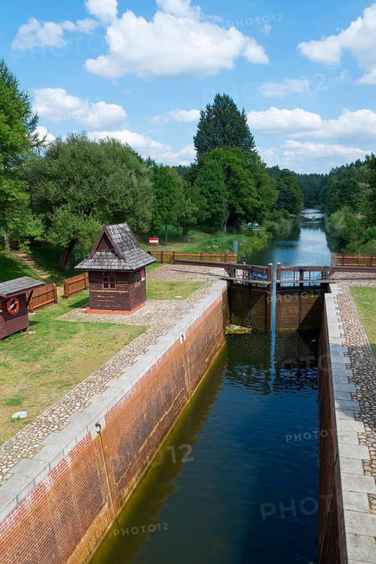 Lock and waterway surrounded by green trees and clear sky, Mikaszówka Lock, Kanal Augustowski, Augustów Canal, Augustow, canal, Mikaszówka, Mikaszowka, Powiat Augustowski, Podlaskie Voivodeship, Poland