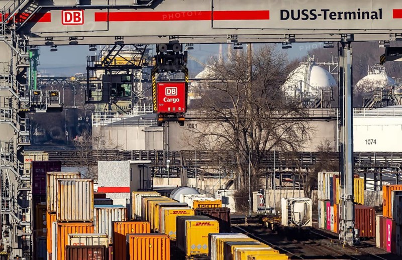 The port of Mannheim is one of the most important inland ports in Europe. The harbor basins stretch across the Rhine and Neckar. DUSS Terminal Deutsche Bahn AG with container from DB Cargo in the Mühlauhafen container terminal. Mannheim, Baden-Württemberg, Germany