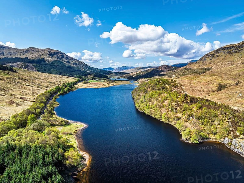 Mountains over Loch Iubhair from a drone, Crianlarich, Highlands, Scotland, United Kingdom