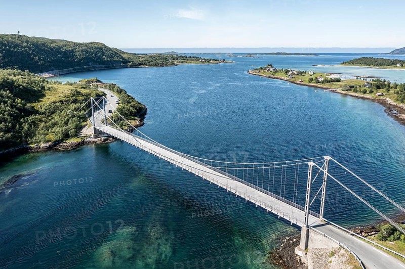 Aerial view of bridge over Straumsbotn fjord, Straumsnes peninsula in the back, RV 86 east of village Hamn i Senja, Senja island, Norway