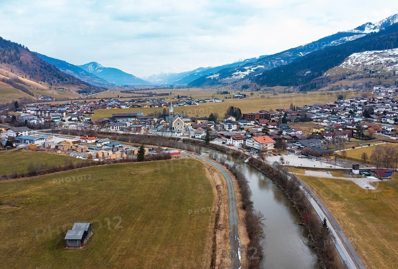 Drone image, residential buildings, view of village with parish church, Niedernsill, Salzach, Pinzgau, Salzburg province, Austria