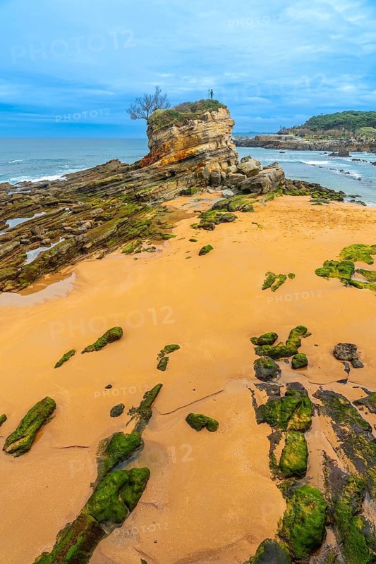 Monument to Neptune Child (Ramon Muriedas) on Camello beach in Santander, Cantabria, Spain