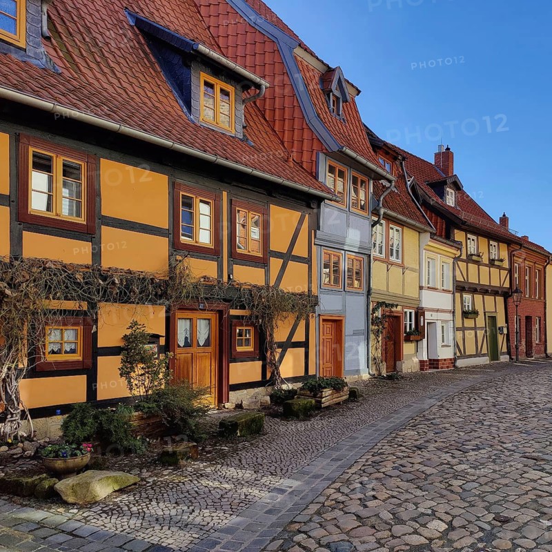 Half-timbered houses with cobblestones in Wassertorstraße, Old Town of the World Heritage City of Quedlinburg, Saxony-Anhalt, Germany