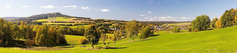 Panorama with Scheibenberg and town view of Schlettau in autumn, in the background the König-August-Turm on the Spiegelwald, Erzgebirge, Saxony, Germany