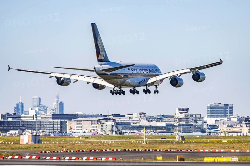 Fraport Airport in Frankfurt am Main. Aircraft landing against the backdrop of the banking district. Aircraft registration: 9V-SKU, Singapore Airlines, Airbus A380-800. Frankfurt am Main, Hesse, Germany