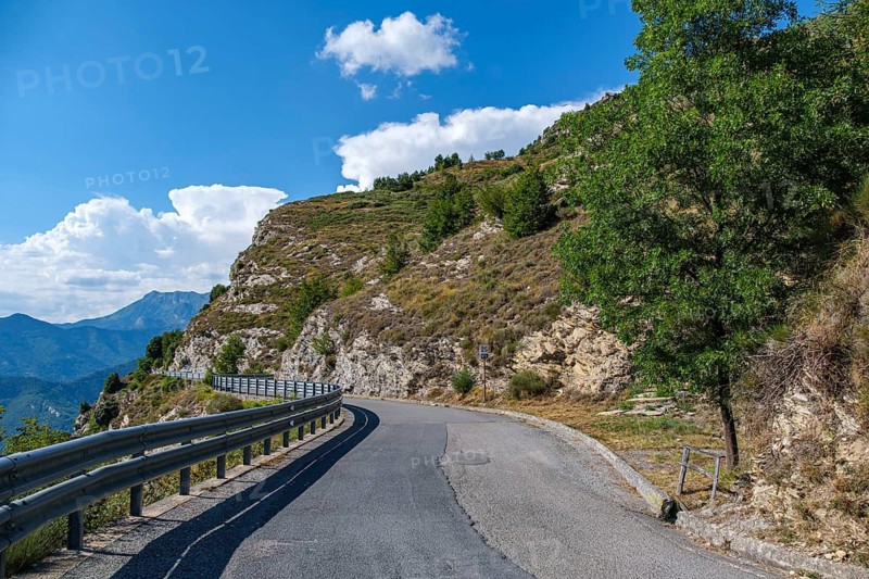 Picturesque landscape on the Strada Provinciale 17 pass road and Capelletta votiva di Drego chapel in the Ligurian Alps, above Molini di Triora, Province of Imperia, Liguria, Italy