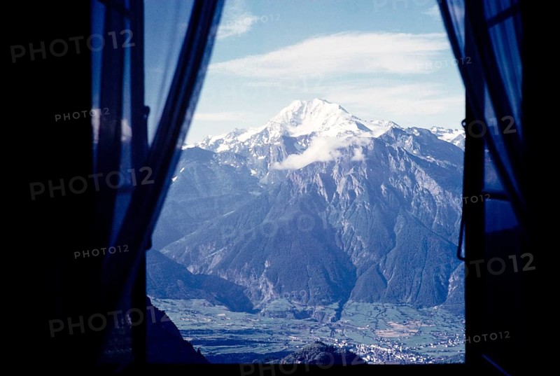 View from the window of the Hotel Belalp of snow-covered mountains and the Breithorn above Brig, Bernese Alps, Switzerland, Europe around 1960
