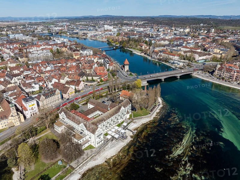 Aerial view of Lake Constance with the Seerhein, also Rhine funnel and the old town of Constance with the Steigenberger Inselhotel, former Dominican monastery, on the right the old Rhine bridge, where the Rhine officially begins at kilometre zero, above the historic Rhine gate tower, district of Constance, Baden-Württemberg, Germany