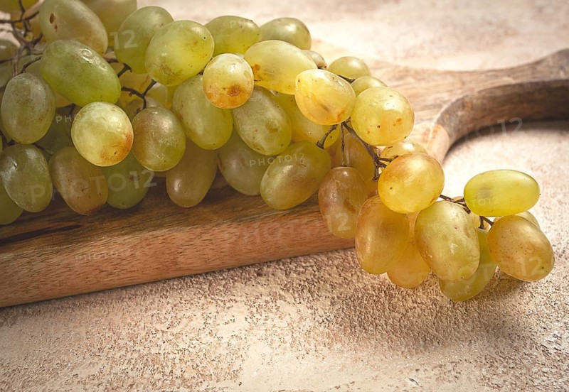 A branch of white grapes, wine grapes, Georgian grape variety Rkatsiteli, top view