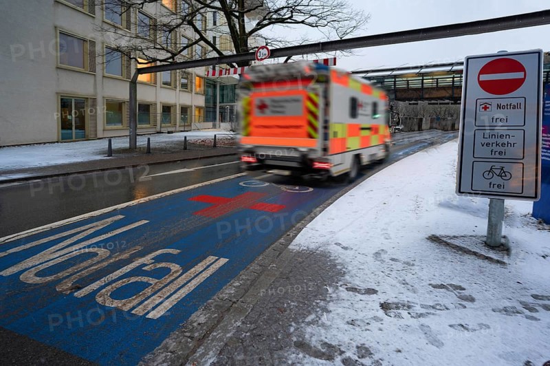 Ambulance on an emergency lane at the University Hospital, Erlangen, Middle Franconia, Bavaria, Germany