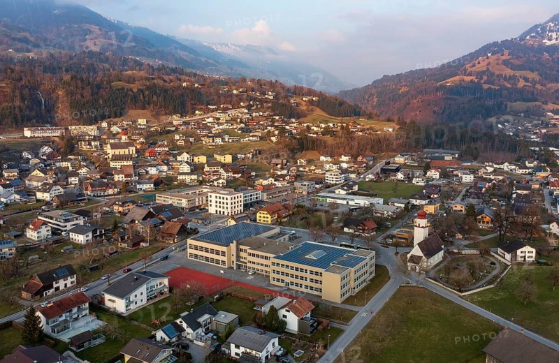 Drone image, residential buildings, settlement area, parish church, Thuringia, Großes Walsertal, Vorarlberg, Austria