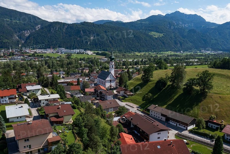 Drone image, view of village with parish church, Breitenbach am Inn, Inntal, Tyrol, Austria