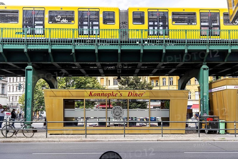Konnopke's snack bar is cult. Konnopke's in Prenzlauer Berg. It was the first snack bar in East Berlin to introduce the currywurst in 1960. Underground as an above-ground elevated railway on a viaduct. Berlin, Germany